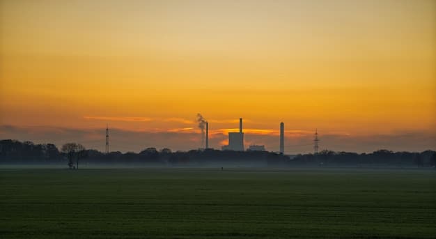 A wind turbine farm at sunset in Iowa, with golden light highlighting the blades and the surrounding cornfields. The image emphasizes the integration of renewable energy with traditional agricultural landscapes.