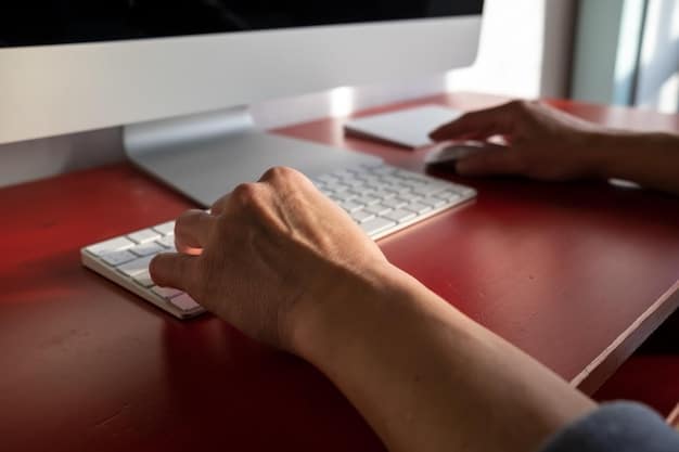 A close-up shot of a hand typing on a keyboard, focusing on the keys related to email and online job boards, symbolizing the recruitment efforts required in the PERM labor certification process.