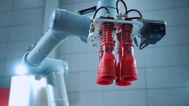 A close-up shot of a robotic arm performing a delicate assembly task on an electronics manufacturing line. The arm is equipped with advanced sensors and AI-powered vision systems.