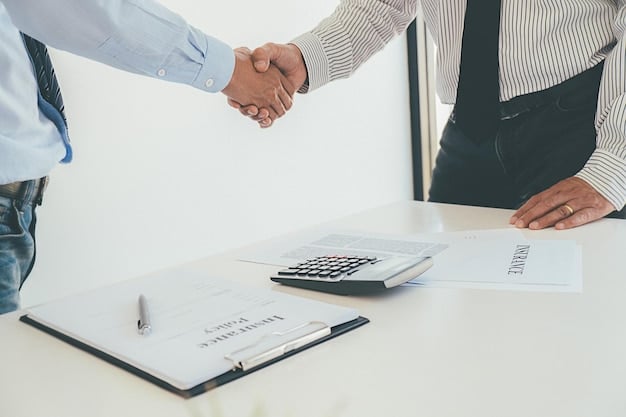 Two hands shaking over a contract, symbolizing a successful debt refinancing agreement. In the background, a calculator and financial documents are visible.