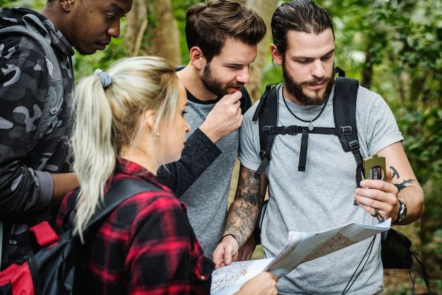 A park ranger giving a safety briefing to a group of hikers before they embark on a trail. The ranger is pointing to a map and explaining potential hazards.