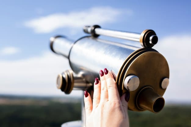A close-up shot of a high-quality telescope set up for stargazing, showing the details of its lenses, mount, and control panel. The background should be a blurred image of stars or the night sky, emphasizing the telescope's purpose.