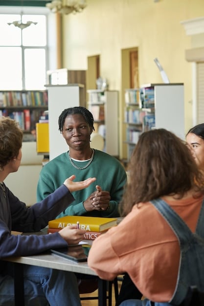 A diverse group of students participating in a lively classroom discussion, with the professor facilitating the conversation. The atmosphere is engaging and collaborative.