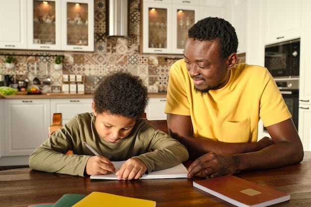 A dad helping a black child with her homework. They are reading a book together at a dinning table.