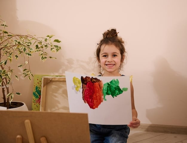 A child proudly displaying their artwork, made with paint and paper, with a teacher smiling approvingly in the background. The environment is colorful and supportive.