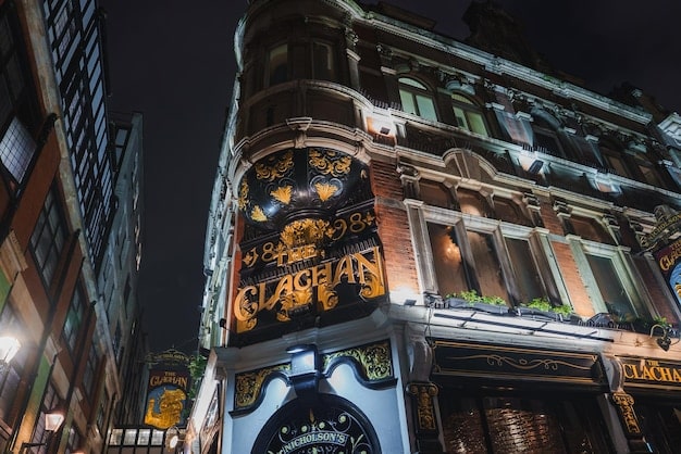 A vibrant nighttime scene in Kansas City's 18th and Vine Historic Jazz District, showcasing the lively atmosphere of jazz clubs and historic buildings.