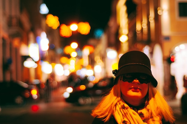 A portrait of a street performer in New Orleans during the golden hour, capturing the warm, soft light on their face and the vibrant colors of the French Quarter.