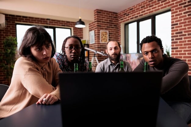 A group of diverse professionals participating in a cybersecurity training session. Laptops are open, and the instructor is pointing to a screen with examples of phishing emails. The room is well-lit, and the atmosphere is engaged and interactive.